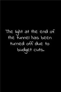 The light at the end of the tunnel has been turned off due to budget cuts.