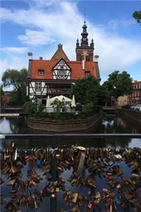 View of Love Locks on a Bridge and Buildings in Gdansk Poland Journal