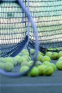 Yellow Tennis Balls and Racquet by the Net Sports and Recreation Journal