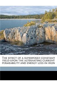 The Effect of a Superposed Constant Field Upon the Alternating Current Permeability and Energy Loss in Iron
