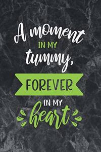 A moment in my tummy forever in my heart