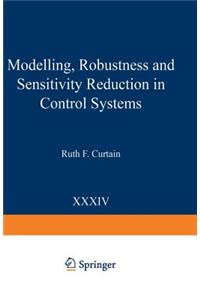 Modelling, Robustness and Sensitivity Reduction in Control Systems