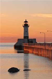 Great Lake Harbor Lighthouse at Sunrise Duluth Minnesota USA Journal