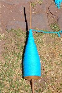 Spindle with Turquoise Yarn Journal