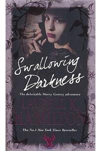 Swallowing Darkness. Laurell K. Hamilton