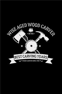 Wise aged wood carver in his best carving years
