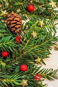 Gorgeous Christmas Greenery with Stars, Holly, and a Pinecone Journal