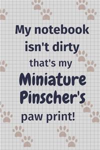 My notebook isn't dirty that's my Miniature Pinscher's paw print!