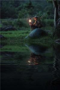 A Boy with a Lantern Sitting by a Lake Nature Journal