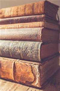 Cool Stack of Antique Books on a Table Journal