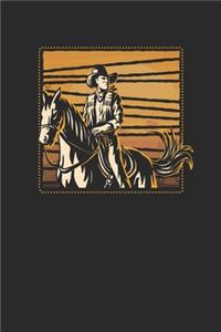 Cowboy In Sunset