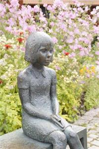 Young Girl Sitting on a Park Bench Sculpture Journal