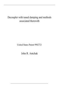 Decoupler with tuned damping and methods associated therewith