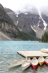 Canoes at Lake Moraine Banff Canada Journal
