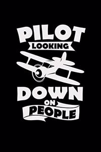 Pilot looking down on people