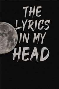 The Lyrics in My Head Notebook with the moon in the background