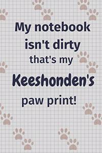 My notebook isn't dirty that's my Keeshonden's paw print!