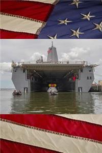 US Navy Amphibious Transport Dock Ship USS Arlington (LPD 24) with Orion Space Capsule Journal