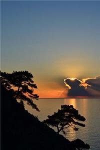 Silhouetted Trees and Golden Etched Clouds and an Ocean Sunset Journal