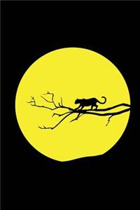 A Black Panther on a Branch with a Full Moon Journal