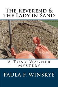 Reverend & the Lady in Sand
