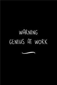 Warning Genius at work