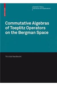 Commutative Algebras of Toeplitz Operators on the Bergman Space