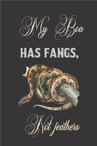 My boa has fangs, not feathers