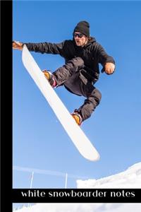 white snowboarder notes