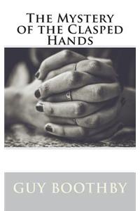 The Mystery of the Clasped Hands