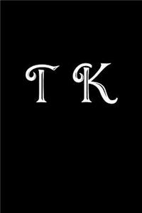 T K