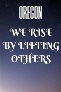 Oregon We Rise By Lifting Others