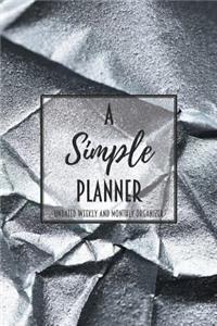 A Simple Planner Undated Weekly and Monthly Organizer