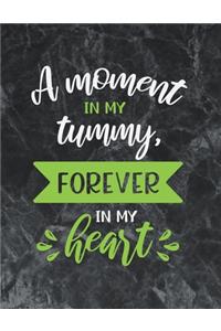 A moment in my tummy forever in my heart