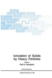 Ionization of Solids by Heavy Particles