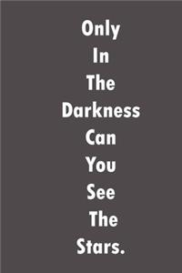 Only in the darkness can you see the stars.