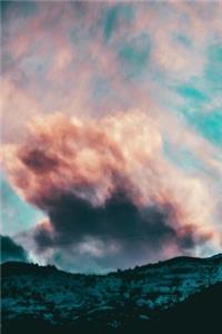 Dramatic Pink Clouds Over the Mountains at Sunset Journal
