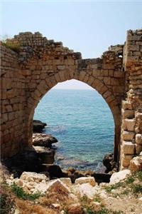 A Gorgeous View of the Mediterranean Sea Through an Ancient Stone Archway Journal