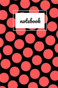 Black and red polka dot print notebook