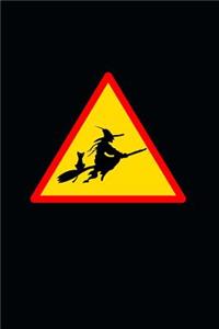 Caution: Wicked Witch on a Broomstick with Her Black Cat Sign Journal: 150 Page Lined Notebook/Diary