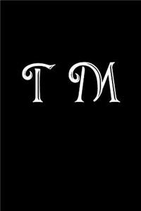 T M
