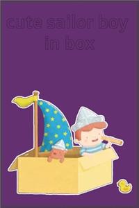 cute sailor boy in box