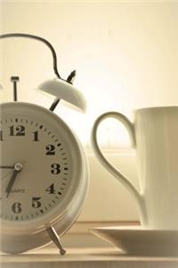 Vintage White Alarm Clock and White Coffee Cup Morning Journal
