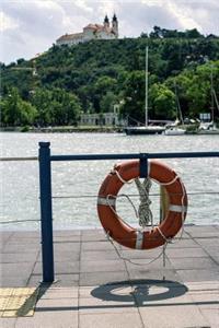 Summer View of the Lake, Boats, and a Church on the Hill Vacation Journal