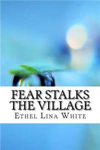 Fear Stalks the Village