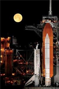 The Space Shuttle Discovery and Moonlight Journal