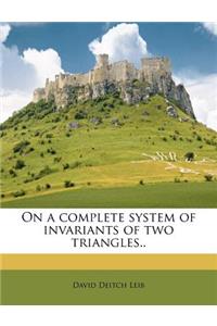 On a Complete System of Invariants of Two Triangles..