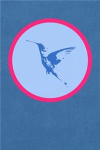 Hummingbird In Flight