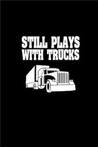 Still plays with trucks