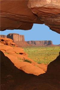 Looking Through a Rock Window in Monument Valley Arizona USA Journal